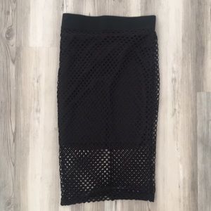 Black midi skirt with fish net detail